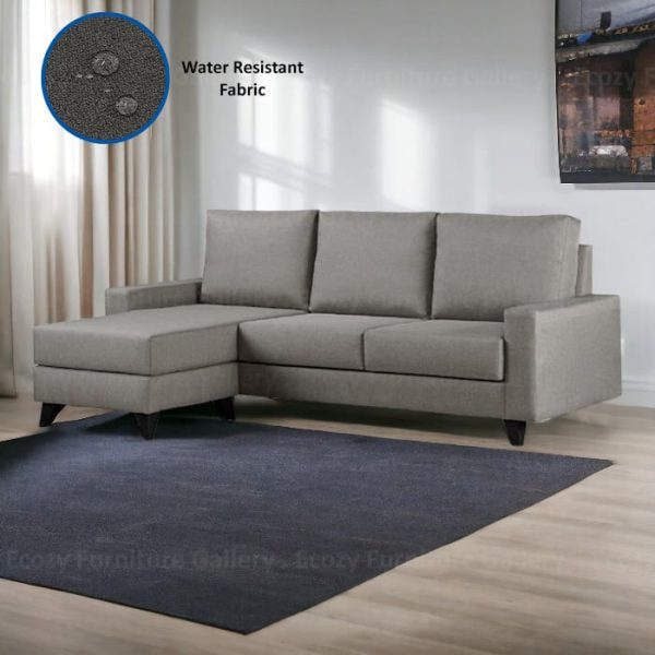 L-Shape Water resistant Fabric Sofa with grey carpet in a bright living room