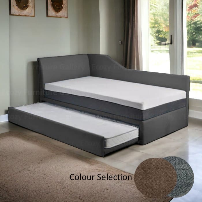 A grey 3 in 1 bed tufted button backrest in a room with wooden flooring and windows. The pull out bed is upholstered by water-repellent fabric with 2 different color selection