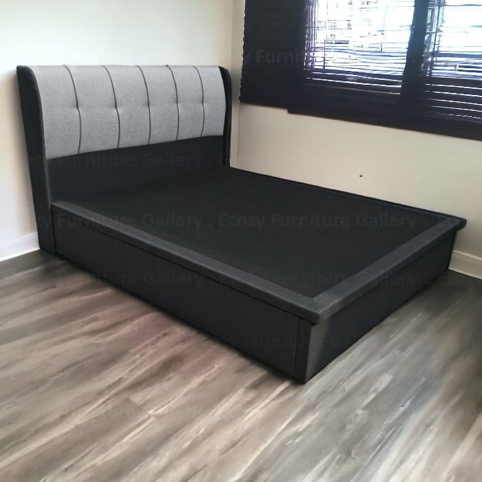 Storage Bed Singapore - a grey color fabric storage bed frame with the wingback design heaboard with a wooden floor in the background