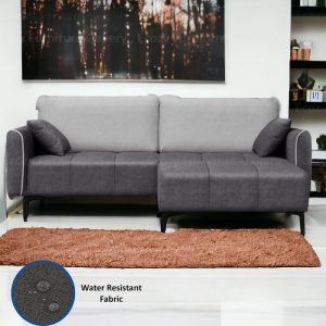 3 seater water resistant fabric sofa with a ottoman, with a brown carpet in a cozy living room