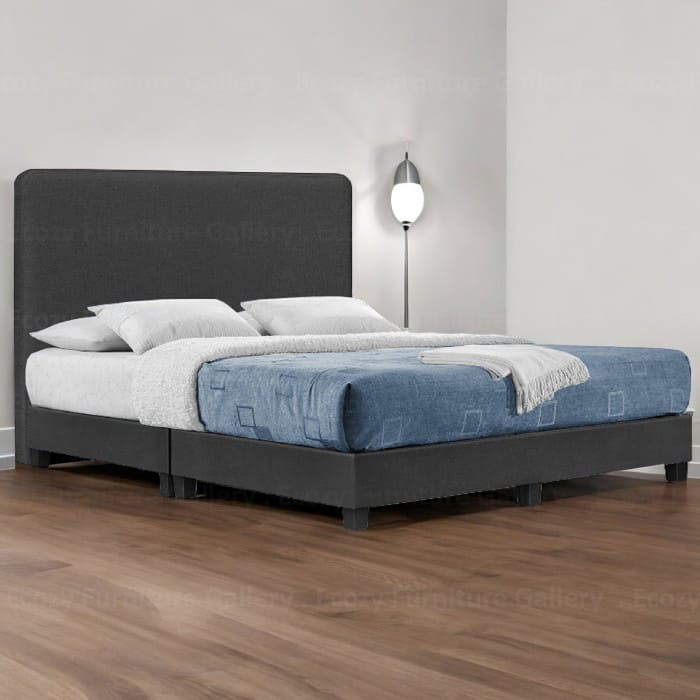 A grey upholstered bed frame with a simple and plain design of headboard and black legs. The bed is made with water-repellent fabric