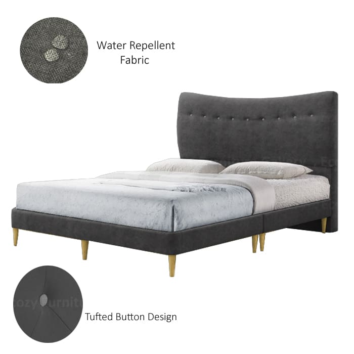 A dark grey upholstered bed frame with a slightly curved, tufted button headboard and light wooden legs. The bed is made with water-repellent fabric