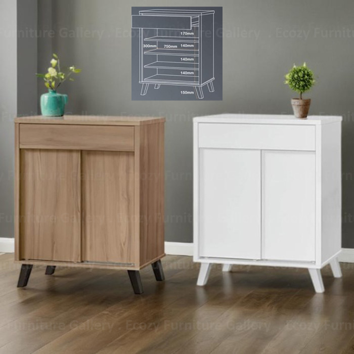 The Shoe cabinet with two doors, featuring white or light brwon wooden furnishing, styled with decorative items on top