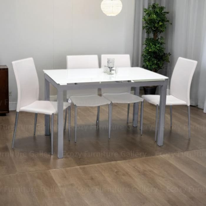 Tempered Glass Dining Set featuring a modern design with four white color dining chair, and a extendable tempered galss dining table