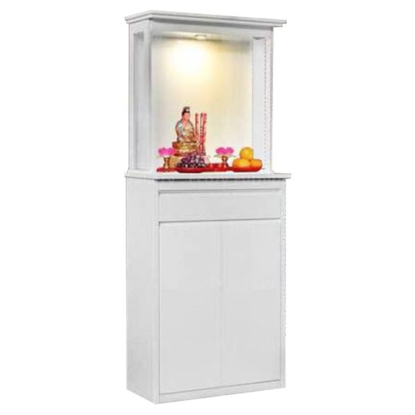 White wooden altar cabinet with a decorative light, featuring a statue, offerings the ample space displayed on a shelf