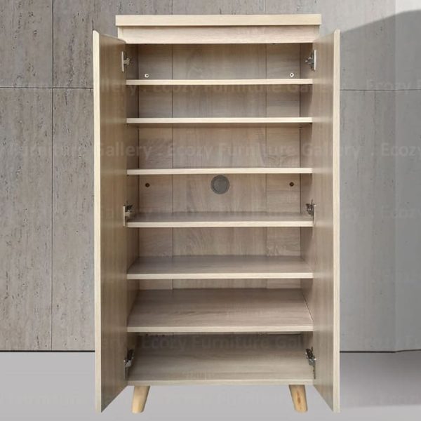 Shoe cabinet with two doors, featuring light brown wood furnishing, styled with decorative items on top, and an interior image showing multiple shelves for organized storage