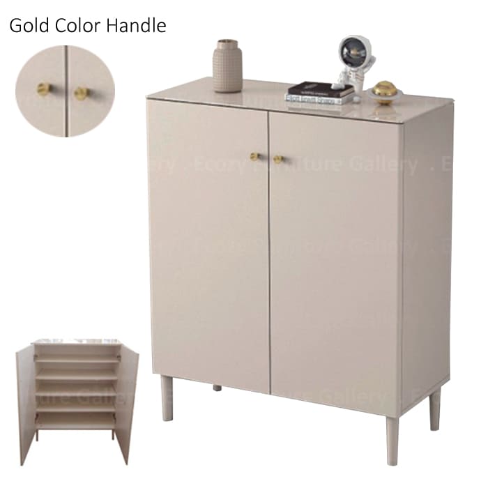 Shoe cabinet with two doors, featuring gold color handles, styled with decorative items on top, and an interior image showing multiple shelves for organized storage