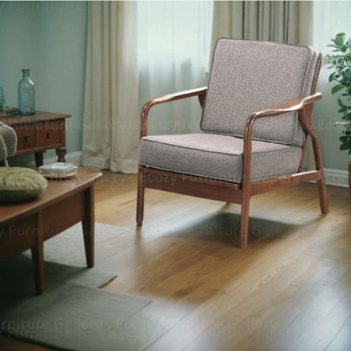 Wooden Sofa with a light brown fabric cushion, featuring wooden armrests and a sleek design, set in a cozy living room with warm lighting and wooden flooring