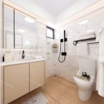 Scandinavian bathroom renovation with natural color wood flooring, a sleek vanity, large mirrors, a shower area, and natural light from windows