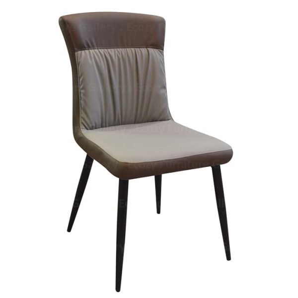 A modern dining chair featuring a leather seat and sleek black metal legs, ideal for modern dining spaces