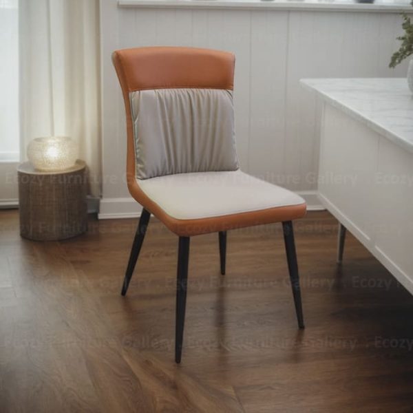 A modern dining chair featuring a leather seat and sleek black metal legs, ideal for modern dining spaces